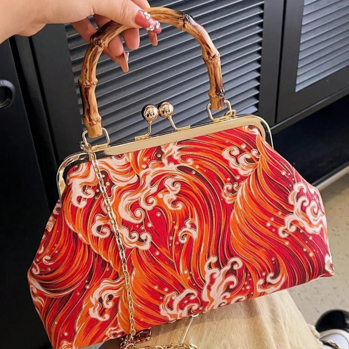 Vivid Scarlet Amber Swirl Wave Pattern Frame Pouch with Curved Natural Form Grip Arch And Linked Metal Chain Kiss Lock Bag