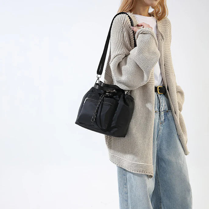 Tone Solid Gathered Bucket Carry Pouch with Dual Carry Fixtures and Front Zip Slip