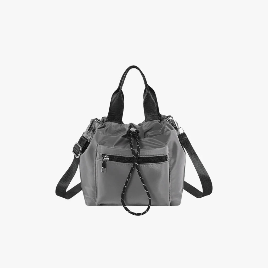 Tone Solid Gathered Bucket Carry Pouch with Dual Carry Fixtures and Front Zip Slip